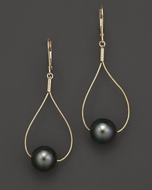 Sleek gold teardrops pierce black Tahitian pearls. Sleek gold teardrops pierce black Tahitian pearls.