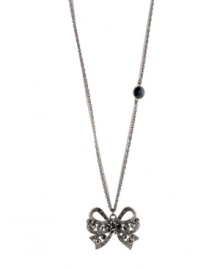 Glittering and gorgeous. Enhance your style with Betsey Johnson's sparkling crystal-adorned bow pendant necklace. Crafted in hematite tone mixed metal. Approximate length: 32 inches + 3-inch extender. Approximate drop: 1-3/4 inches. Glittering and gorgeous. Enhance your style with Betsey Johnson's sparkling crystal-adorned bow pendant necklace. Crafted in hematite tone mixed metal. Approximate length: 32 inches + 3-inch extender. Approximate drop: 1-3/4 inches.