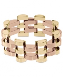 Fashion as an art form. This art deco-inspired bracelet from Michael Kors mesmerizes with an open-link design in golden and rosy hues. Crafted in gold tone and rose-gold tone brass. Approximate length: 7 inches. Fashion as an art form. This art deco-inspired bracelet from Michael Kors mesmerizes with an open-link design in golden and rosy hues. Crafted in gold tone and rose-gold tone brass. Approximate length: 7 inches.