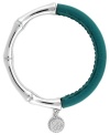 One part Zen and one part colorblock equals two parts fabulous! Jessica Simpson's totally-chic bangle features a serene bamboo setting in silver tone mixed metal combined with stretchable bright blue polyurethane. Approximate length (when stretched): 10 inches.