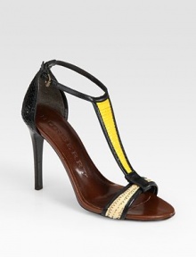 Textured raffia and smooth leather in a colorblocked t-strap design. Stacked heel, 4 (100mm)Raffia and leather upperLeather lining and solePadded insoleMade in ItalyOUR FIT MODEL RECOMMENDS ordering true size. Textured raffia and smooth leather in a colorblocked t-strap design. Stacked heel, 4 (100mm)Raffia and leather upperLeather lining and solePadded insoleMade in ItalyOUR FIT MODEL RECOMMENDS ordering true size.