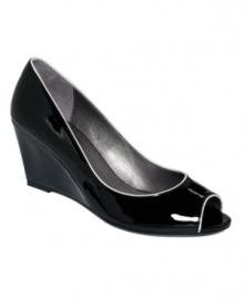 Lighten your look with the high-shine finish of the Mallory pumps by Adrienne Vittadini. Their on-trend wedge profile is trimmed with a touch of contrasting color. Lighten your look with the high-shine finish of the Mallory pumps by Adrienne Vittadini. Their on-trend wedge profile is trimmed with a touch of contrasting color.