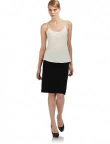THE LOOKScoopneckThin spaghetti strapsGently ruffled hemV-backTHE FITAbout 25½ from shoulder to hemTHE MATERIALSilkCARE & ORIGINDry cleanMade in ItalyModel shown is 5'10½ (179cm) wearing US size 4. THE LOOKScoopneckThin spaghetti strapsGently ruffled hemV-backTHE FITAbout 25½ from shoulder to hemTHE MATERIALSilkCARE & ORIGINDry cleanMade in ItalyModel shown is 5'10½ (179cm) wearing US size 4.