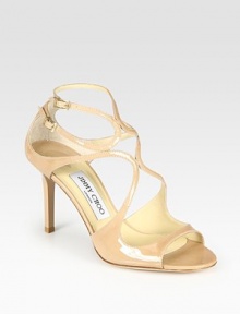 Adjustable, architectural straps in lustrous patent leather accompany a lacquered heel. Stacked cork wedge, 3½ (90mm)Patent leather upperLeather lining and solePadded insoleMade in ItalyOUR FIT MODEL RECOMMENDS ordering one size up as this style runs small. Adjustable, architectural straps in lustrous patent leather accompany a lacquered heel. Stacked cork wedge, 3½ (90mm)Patent leather upperLeather lining and solePadded insoleMade in ItalyOUR FIT MODEL RECOMMENDS ordering one size up as this style runs small.