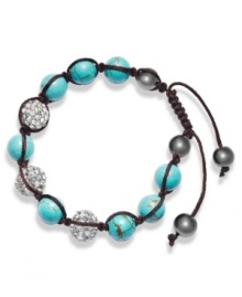 Spiritual-inspired bracelets are all the rage this season! Snap up this hot style from Ali Khan featuring semi-precious turquoise beads and pave glass fireballs on a trendy black cord. Bracelet adjusts to fit the wrist. Approximate diameter: 2 inches. Approximate length: 12-1/4 inches. Spiritual-inspired bracelets are all the rage this season! Snap up this hot style from Ali Khan featuring semi-precious turquoise beads and pave glass fireballs on a trendy black cord. Bracelet adjusts to fit the wrist. Approximate diameter: 2 inches. Approximate length: 12-1/4 inches.