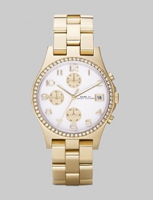 A classic chronograph dial with goldplated stainless steel bracelet and crystal bezel.Quartz movement Water resistant to 3 ATM Crystal bezel White chronograph dial Arabic numeral hour markers Date display at 3 o'clock Second hand Goldplated stainless steel link bracelet, 18mm, (.71) Imported 