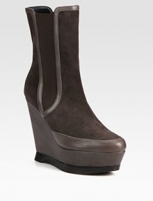 Pebble-grain leather and suede combine in this elevated wedge silhouette with elastic gores for a comfortable fit. Leather-covered and stacked heel, 5 (125mm)Leather-covered and stacked platform, 1¾ (45mm)Compares to a 3¼ heel (80mm)Leather and suede upper with elastic goresPull-on styleLeather liningRubber solePadded insoleMade in Italy Pebble-grain leather and suede combine in this elevated wedge silhouette with elastic gores for a comfortable fit. Leather-covered and stacked heel, 5 (125mm)Leather-covered and stacked platform, 1¾ (45mm)Compares to a 3¼ heel (80mm)Leather and suede upper with elastic goresPull-on styleLeather liningRubber solePadded insoleMade in Italy