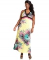 Start spring off right with Baby Phat's halter plus size maxi dress, spotlighting a striking floral print!