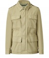 Narrow parka-cut jacket by New York designer Marc Jacobs is a must-have piece all year round - Casual and versatile in beige-colored cotton - Moderately long with shoulder bars, flap pockets, hidden zipper placket and top botton closure - Fits all relaxed looks with effortless style