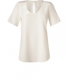 A pristine ecru hue and delicate washed silk inform this chic and versatile tee from Joseph - Scoop neckline, short sleeves, slit at nape with hidden hook closure, shirttail hemline - Loose fit - Wear with leather leggings and ankle boots, or tucked into a pencil skirt with heels A pristine ecru hue and delicate washed silk inform this chic and versatile tee from Joseph - Scoop neckline, short sleeves, slit at nape with hidden hook closure, shirttail hemline - Loose fit - Wear with leather leggings and ankle boots, or tucked into a pencil skirt with heels