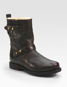 Rustic leather with adjustable motorcycle-inspired straps, softened by a plush shearling lining. Stacked heel, 1 (25mm)Leather upperShearling liningLeather solePadded insoleImported Rustic leather with adjustable motorcycle-inspired straps, softened by a plush shearling lining. Stacked heel, 1 (25mm)Leather upperShearling liningLeather solePadded insoleImported