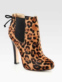 Luxe leopard-print calf hair forms this towering silhouette with an unexpected lace-up suede back. Leather-covered heel, 4¾ (120mm)Hidden platform, 1 (25mm)Compares to a 3¾ heel (95mm)Leopard-print calf hair upper with side elastic gores and suede trimPull-on styleLeather liningLeather and rubber solePadded insoleImported Luxe leopard-print calf hair forms this towering silhouette with an unexpected lace-up suede back. Leather-covered heel, 4¾ (120mm)Hidden platform, 1 (25mm)Compares to a 3¾ heel (95mm)Leopard-print calf hair upper with side elastic gores and suede trimPull-on styleLeather liningLeather and rubber solePadded insoleImported