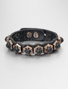 An edgy design featuring cross-stitched details on a supple leather cuff. LeatherRose goldtoneLength, about 7Studded closureImported An edgy design featuring cross-stitched details on a supple leather cuff. LeatherRose goldtoneLength, about 7Studded closureImported