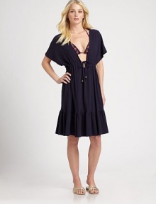 A coverup that doesn't compromise comfort to be stylish. Its self-tie waist complements the figure flawlessly. Short sleevesSelf-tie92% rayon/8% spandexDry cleanImported A coverup that doesn't compromise comfort to be stylish. Its self-tie waist complements the figure flawlessly. Short sleevesSelf-tie92% rayon/8% spandexDry cleanImported