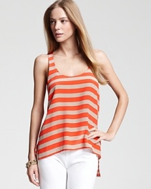 Easy to wear and effortlessly cool, this versatile BCBGMAXAZRIA striped tank is a luxe piece to pair with staple white pants for cabana-chic. Easy to wear and effortlessly cool, this versatile BCBGMAXAZRIA striped tank is a luxe piece to pair with staple white pants for cabana-chic.