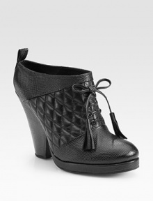 Quilted, tastefully textured leather with tassel laces and a chunky heel. Embossed leather heel, 4½ (115mm)Covered platform, ½ (15mm)Compares to a 4 heel (100mm)Leather upperLeather liningBuffed leather soleImportedOUR FIT MODEL RECOMMENDS ordering true size. Quilted, tastefully textured leather with tassel laces and a chunky heel. Embossed leather heel, 4½ (115mm)Covered platform, ½ (15mm)Compares to a 4 heel (100mm)Leather upperLeather liningBuffed leather soleImportedOUR FIT MODEL RECOMMENDS ordering true size.