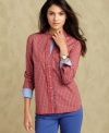 Tommy Hilfiger's plaid and ruffled shirt is a crisp addition to your casual wardrobe.