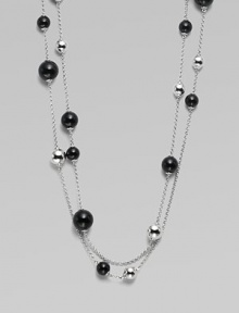 A very long, delicate piece with beautiful round black agate and contrasting sterling silver stations on a link chain, perfect for wearing doubled. Black agateSterling silverLength, about 51Clasp closureImported A very long, delicate piece with beautiful round black agate and contrasting sterling silver stations on a link chain, perfect for wearing doubled. Black agateSterling silverLength, about 51Clasp closureImported