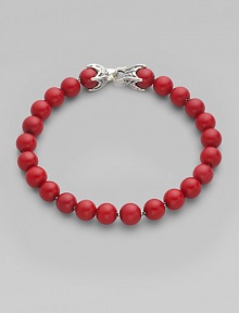Smooth, polished coral beads are laced on a sterling silver chain. From the Spiritual Bead Collection Sterling silver Coral 8mm beads About 8½ long Lobster clasp Imported Smooth, polished coral beads are laced on a sterling silver chain. From the Spiritual Bead Collection Sterling silver Coral 8mm beads About 8½ long Lobster clasp Imported