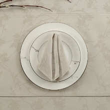 Cotton table mat embellished with an earthy flair of sprigs allover. This place setting is suitable for refined entertaining. Cotton table mat embellished with an earthy flair of sprigs allover. This place setting is suitable for refined entertaining.