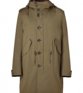 The classic army coat goes luxe with this style-centric iteration from Burberry Brit - Drawstring hood with checked knit lining, stand-up collar, long sleeves, belted cuffs, buttoned epaulettes, two-way front zip, button panel, drawstring waistline, snapped flap pockets, drawstring fishtail hemline, zip-away checked knit vest lining - Classic straight fit - Wear with everything from jeans and boots to tailored trousers and button-downs