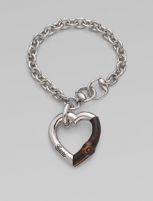 From the Bamboo Collection. A study in contrasts with this sterling silver and bamboo heart charm on a rolo chain. Sterling silver Lenth, about 7¼ Pendant width, about 2 Lobster clasp closure Made in Italy 