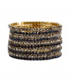 Inject instant glamour into any outfit with R.J.Grazianos set of stretchy bangles, a chic and easy choice for dressing up your look - Prong set stones, slips on - Wear with edgy separates, or as a finishing touch to cocktail dresses