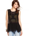 The sheer fabric and eyelet panels lighten up this black Free People top for a look that's delicate without being demure.
