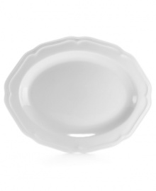 A large elegant way to serve a main course, this gracefully shaped platter from Mikasa's Antique White dinnerware and dishes collection has a soft geometric feel and clean, embossed design. A large elegant way to serve a main course, this gracefully shaped platter from Mikasa's Antique White dinnerware and dishes collection has a soft geometric feel and clean, embossed design.