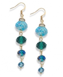 Vibrant and varied. Different sizes of glass rondelle beads combine with tasteful turquoise hues on c.A.K.e. by Ali Khan's rondelle beaded linear drop earrings. Crafted in gold tone mixed metal, they're adorned with sparkling clear crystals. Approximate drop: 2 inches. Vibrant and varied. Different sizes of glass rondelle beads combine with tasteful turquoise hues on c.A.K.e. by Ali Khan's rondelle beaded linear drop earrings. Crafted in gold tone mixed metal, they're adorned with sparkling clear crystals. Approximate drop: 2 inches.