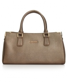 Ladylike with elegant accents, this petite satchel from Calvin Klein stylishly totes your everyday essentials with ease. Sumptuous Saffiano leather is the perfect backdrop for subtle golden hardware and detail stitching. It's the perfect accessory for any occasion,