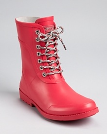 A shocking pink hue adds a bright spot to dreary days while climbing rope inspired laces feel right on-trend. From DKNY. A shocking pink hue adds a bright spot to dreary days while climbing rope inspired laces feel right on-trend. From DKNY.