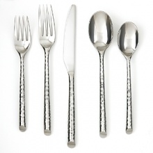 This set includes four each of a dinner fork, dinner spoon, salad fork, teaspoon and dinner knife. This set includes four each of a dinner fork, dinner spoon, salad fork, teaspoon and dinner knife.