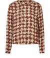 A super-chic abstract houndstooth print covers this silk top from Burberry Brit - Round neck, long sleeves, relaxed silhouette, slightly cropped, all-over print - Pair with high-waist skinnies or a pencil skirt and heels