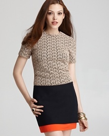 Impeccably tailored in delicate lace, this DIANE von FURSTENBERG top exudes feminine charm. Impeccably tailored in delicate lace, this DIANE von FURSTENBERG top exudes feminine charm.