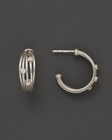 Brilliant diamonds accent bands of sterling silver in India Hicks' hoop earrings. Brilliant diamonds accent bands of sterling silver in India Hicks' hoop earrings.