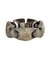 With a stylish tribal-inspired motif, this boho-chic bracelet from Ben-Amun is a new season must-have - Hinge closure, interlocking circular detailing, all-over strip pattern - Pair with denim cut offs, a billowy blouse, and fringe-detailed ankle boots