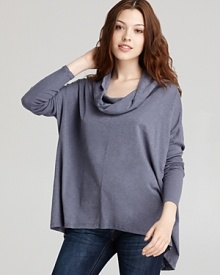 A voluminous silhouette and drapey cowlneck bring laid-back elegance to this Velvet by Graham & Spencer top. A voluminous silhouette and drapey cowlneck bring laid-back elegance to this Velvet by Graham & Spencer top.