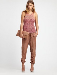 A true representation of this season's sports-luxe trend, these jogging pants are crafted from the finest lambskin leather and shaped by a slightly tapered fit. Elastic waistbandElastic cuffsRise, about 11Inseam, about 27LeatherDry clean with leather specialistImportedSIZE & FITModel shown is 5'10 (177cm) wearing US size 4. A true representation of this season's sports-luxe trend, these jogging pants are crafted from the finest lambskin leather and shaped by a slightly tapered fit. Elastic waistbandElastic cuffsRise, about 11Inseam, about 27LeatherDry clean with leather specialistImportedSIZE & FITModel shown is 5'10 (177cm) wearing US size 4.