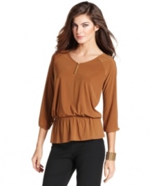 Pep up your look with Ellen Tracy's peasant top, complete with a feminine peplum and goldtone buttons. Pep up your look with Ellen Tracy's peasant top, complete with a feminine peplum and goldtone buttons.