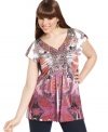 Pair One World's sublimated-print plus size top with your fave jeans for a standout statement!