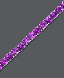 Deep violet decadence. Set in sterling silver, round-cut amethyst (7 ct. t.w.) makes quite a statement in this bracelet. Approximate length: 7 inches. Deep violet decadence. Set in sterling silver, round-cut amethyst (7 ct. t.w.) makes quite a statement in this bracelet. Approximate length: 7 inches.