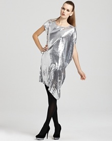 Putting a new slant on dazzling after dark, this MICHAEL Michael Kors sequin dress is designed with an asymmetric hem that's perfect for showcasing statement party heels. Putting a new slant on dazzling after dark, this MICHAEL Michael Kors sequin dress is designed with an asymmetric hem that's perfect for showcasing statement party heels.