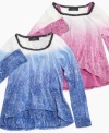 Dyed prints brighten her fall look with this asymmetrical hemmed long-sleeved tees from Jessica Simpson. (Clearance)