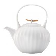 Pure in form, function and feel, each naturally-shaped teapot from Donna Karan beg to be touched.