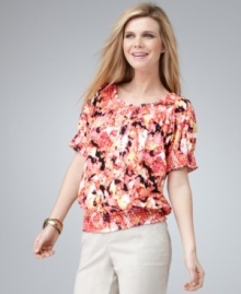 A vibrant print updates a pretty peasant top from Style&co. Wear it with jeans, shorts or capris for a fun anytime look! A vibrant print updates a pretty peasant top from Style&co. Wear it with jeans, shorts or capris for a fun anytime look!
