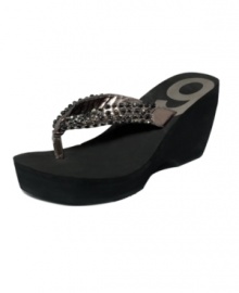 A most exquisite wedge. Nine West's Exceptional thong sandals help you put height and sparkle back into your life. A most exquisite wedge. Nine West's Exceptional thong sandals help you put height and sparkle back into your life.
