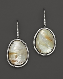 Diamonds circle a faceted doublet of rutilated quartz over mother of pearl, set in blackened sterling silver. By Di Massima. Diamonds circle a faceted doublet of rutilated quartz over mother of pearl, set in blackened sterling silver. By Di Massima.