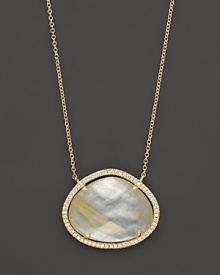 Diamonds circle a faceted rutilated quartz and mother-of-pearl doublet set in 18K yellow gold. By Di Massima. Diamonds circle a faceted rutilated quartz and mother-of-pearl doublet set in 18K yellow gold. By Di Massima.