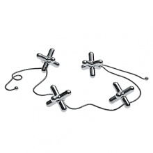 Trivet with movable pieces to look like jacks is designed by Gabriele Chiave. Trivet with movable pieces to look like jacks is designed by Gabriele Chiave.